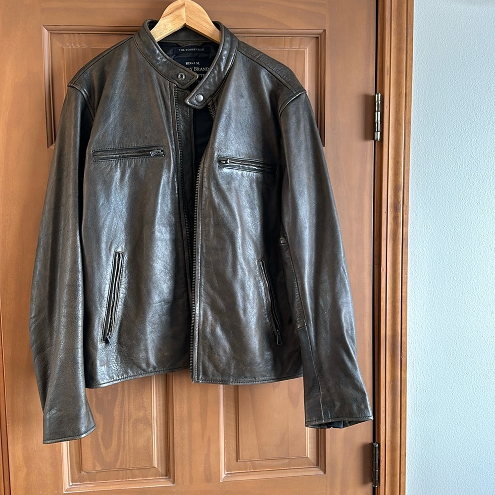 The Boneville Racer vintage brown Lucky Brand Men’s medium leather jacket.